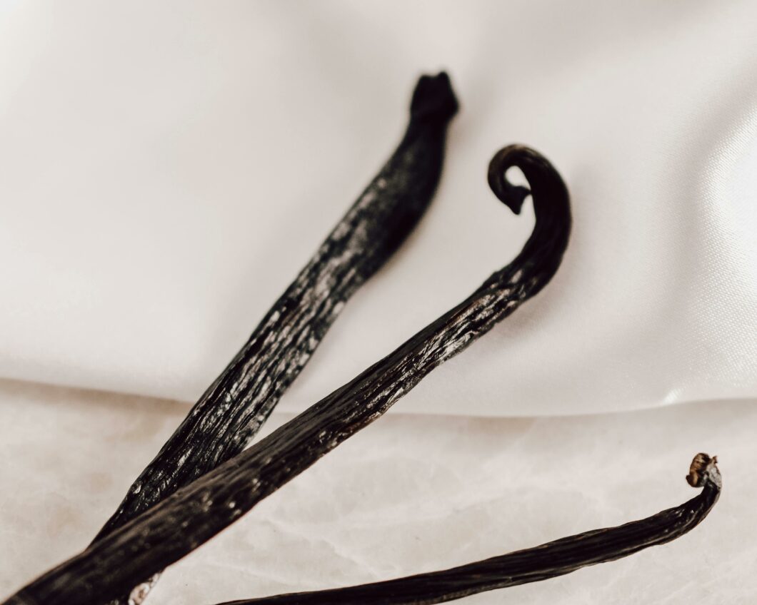 Photo of vanilla bean pods taken by Photo by Qwirki & Co.