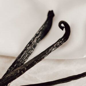 Photo of vanilla bean pods taken by Photo by Qwirki & Co.